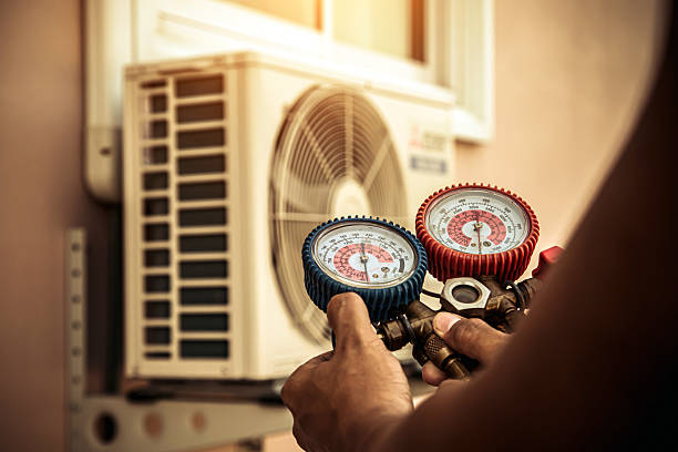 Professional Heat Pump Repair technician working in Stayton, OR